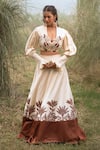 Buy_Kushani_Ivory Satin, Linen Tassels, Beads Round Neck Floral Serenity Lehenga Set _at_Aza_Fashions