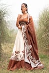 Shop_Kushani_Brown Satin, Linen, Chanderi Beads, Embroidery, Applique Floral Lehenga Set _at_Aza_Fashions