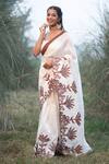Shop_Kushani_Ivory Linen, Silk Lace, Beads, Embroidery Round Neck Floral Saree And Blouse Set _at_Aza_Fashions