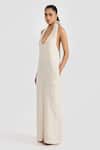 PERONA_Beige Linen Halter Neck Leilani Jumpsuit _Online_at_Aza_Fashions
