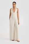 Buy_PERONA_Beige Linen Halter Neck Leilani Jumpsuit _at_Aza_Fashions