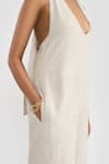 PERONA_Beige Linen Halter Neck Leilani Jumpsuit _at_Aza_Fashions