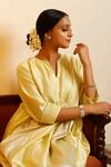 Shop_Eeda_Yellow Chinon, Shantoon Round Neck Lemon Chiniya Silk Anarkali _Online_at_Aza_Fashions