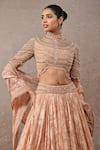 Tarun Tahiliani_Peach Tulle Pearls, Sequins, Tassels Round Neck Embroidered Lehenga Set _Online_at_Aza_Fashions