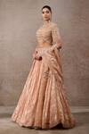 Buy_Tarun Tahiliani_Peach Tulle Pearls, Sequins, Tassels Round Neck Embroidered Lehenga Set _Online_at_Aza_Fashions