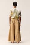 Shop_Kharakapas_Beige Oxford, Cotton Pleated Flared Pants _at_Aza_Fashions