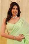B'Infinite_Green Georgette Beads, Pastel Ruffle Embellished Draped Saree With Blouse _Online_at_Aza_Fashions
