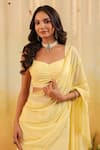 B'Infinite_Yellow Georgette Beads Sweetheart Butter Embellished Draped Saree With Blouse _Online_at_Aza_Fashions