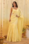 Buy_B'Infinite_Yellow Georgette Beads Sweetheart Butter Embellished Draped Saree With Blouse _at_Aza_Fashions