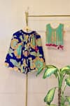 Shop_Rage Attire-Sweta Saria_Blue Bamboo Fringe, Pom-poms Floral Print Lehenga And Top Set _at_Aza_Fashions