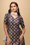 Samyukta Singhania_Navy Brocade, Net V-neck Woven Kurta Palazzo Suit Set _at_Aza_Fashions