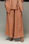 Urvashi Kaur_Orange Linen Aron Handwoven Pant _Online_at_Aza_Fashions