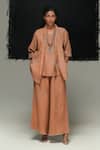 Buy_Urvashi Kaur_Orange Linen Aron Handwoven Pant _at_Aza_Fashions
