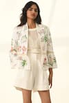 Payal Pratap_Ivory Cotton, Linen Embroidery Open Neck Floral Peplum Jacket _at_Aza_Fashions