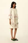 Payal Pratap_Ivory Handloom Cotton Embroidery Round Neck Mutabilis Tiered Dress _Online_at_Aza_Fashions