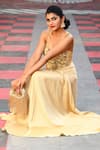 Shop_Nayaab By Sonia_Gold Beads, Tassels Embellished Sailor Potli _at_Aza_Fashions
