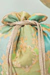 Amyra_Green Pearls, Tassels Abstract Art Banarasi Potli _at_Aza_Fashions