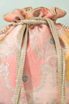 Amyra_Peach Pearls, Beads Abstract Art Banarasi Potli _at_Aza_Fashions