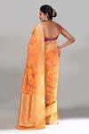 Shop Samyukta Singhania Orange Flower Weave Banarasi Silk Saree With Running Blouse at Aza Fashions Shop_Samyukta Singhania_Orange Flower Weave Banarasi Silk Saree With Running Blouse _at_Aza_Fashions