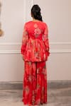 Shop_Paulmi And Harsh_Pink Georgette Tassels V-neck Floral Printed Peplum Tunic And Palazzo Set _at_Aza_Fashions