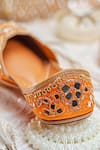 Shop_NR By Nidhi Rathi_Orange Embroidered Flat Juttis _Online_at_Aza_Fashions