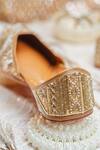 Shop_NR By Nidhi Rathi_Gold Handcrafted Leather Embellished Juttis _Online_at_Aza_Fashions