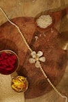Shop_Floristaa By Mahek_White Rhinestones, Pearls Ira Rakhi Lumba Set _at_Aza_Fashions