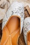 Shop NR By Nidhi Rathi White Handcrafted Embroidered Leather Juttis Shop_NR By Nidhi Rathi_White Handcrafted Embroidered Leather Juttis