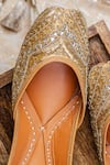 Shop NR By Nidhi Rathi Gold Gold-toned Embroidered Flat Juttis Shop_NR By Nidhi Rathi_Gold Gold-toned Embroidered Flat Juttis