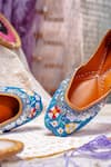 Shop_NR By Nidhi Rathi_Blue Hand-embroidered Leather Flat Juttis 