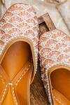 Shop_NR By Nidhi Rathi_Rose Gold Embroidered Flat Juttis 
