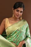 Samyukta Singhania_Green Flower Weave Banarasi Silk Saree With Running Blouse _at_Aza_Fashions