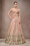 Buy_Tarun Tahiliani_Ivory Tulle, Net Sequins, Beads Round Neck Ivory-gold Lehenga Set _at_Aza_Fashions