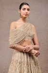 Tarun Tahiliani_Gold Tulle, Net Sequins, Beads Off-shoulder Embroidered Lehenga Set _Online_at_Aza_Fashions