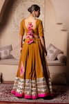 Shop_Pomcha Jaipur_Mustard Velvet, Net Tassels Round Neck Lehenga Set _at_Aza_Fashions