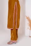 Pomcha Jaipur_Mustard Velvet, Net Gota Patti V-neck Kurta Pant Set _at_Aza_Fashions