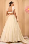 One Knot One By Ashna_Ivory Organza Fabric Flowers, Sequins Sweetheart Neck Lehenga Set _Online_at_Aza_Fashions