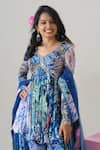 House Of Akshata_Blue Georgette, Net Embroidery, Sequins Round Neck Midnight Bloom Peplum Set _at_Aza_Fashions