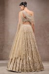Shop_Tarun Tahiliani_Gold Tulle, Net Sequins, Beads Off-shoulder Embroidered Lehenga Set _at_Aza_Fashions