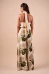 Shop_Shriya Som_Multi Color Crepe Beads Halter Neck Hydrangea Print Jumpsuit _at_Aza_Fashions