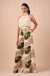 Buy_Shriya Som_Multi Color Crepe Beads Halter Neck Hydrangea Print Jumpsuit _at_Aza_Fashions