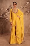 Buy_Label Niti Bothra_Yellow Silk Embroidery, Gota Patti, Tassels Round Neck Dark Sharara Set _at_Aza_Fashions