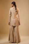 Shop_Label Niti Bothra_Ivory Silk, Chinon Zari, Embroidery, Tassels, Gota Patti Round Neck Sharara Set _at_Aza_Fashions