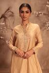 Label Niti Bothra_Ivory Silk Tassels Mandarin Collar Embroidered Sharara Set _at_Aza_Fashions