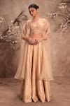 Buy_Label Niti Bothra_Cream Silk, Organza Zari, Mirrors Round Neck Embroidered Lehenga Cape Corset Set _at_Aza_Fashions