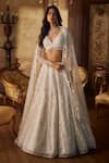 Buy_Seema Gujral_Ivory Net Tassels, Pearls, Sequins Plunge Neck Floral Lehenga Set _at_Aza_Fashions