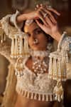 Buy_Seema Gujral_Beige Net Pearls, Tassels, Crystals Sweetheart Neck Embroidered Lehenga Set _Online_at_Aza_Fashions