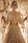 Seema Gujral_Beige Net Pearls, Tassels, Crystals Sweetheart Neck Embroidered Lehenga Set _Online
