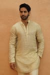 Shop_Sva By Sonam & Paras Modi_Ivory Silk Chanderi Stripe Embellished Kurta Set _at_Aza_Fashions