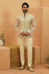 Buy_Sva By Sonam & Paras Modi_Ivory Embroidery Embellished Beige Rawsilk Bundi _at_Aza_Fashions